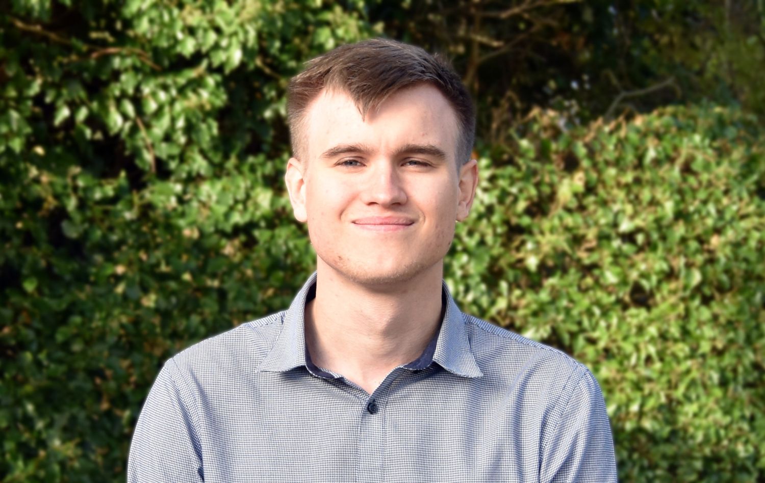 Headshot of William Reed